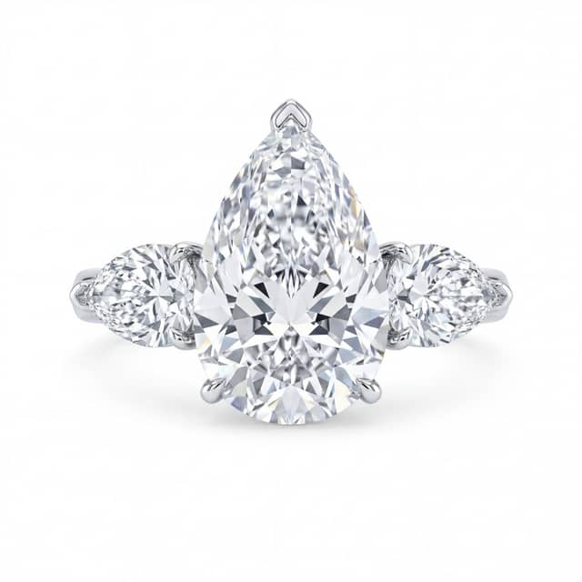 Three-stone ring with a pear-shaped lab-grown center diamond and two pear-shaped lab-grown side stones, from the Prestige Diamonds catalog